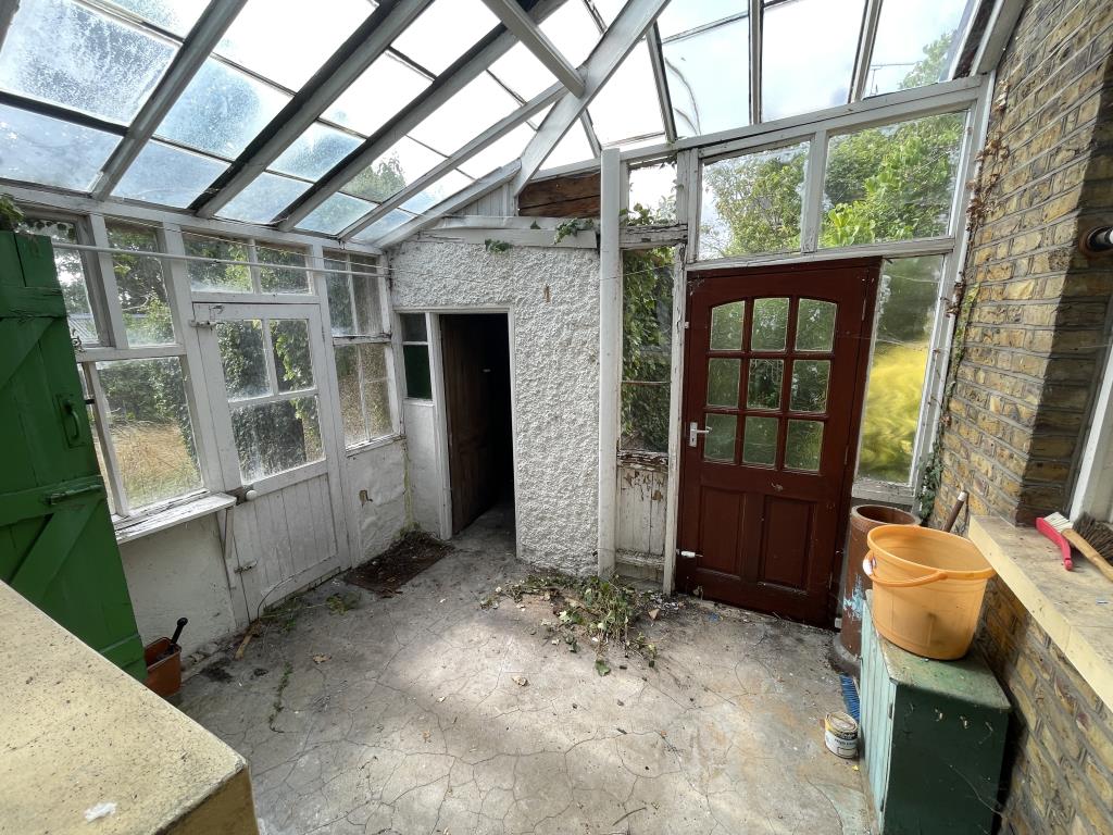 Lot: 133 - DETACHED BUNGALOW ON SIZEABLE PLOT WITH POTENTIAL - Inside image of lean to from kitchen
