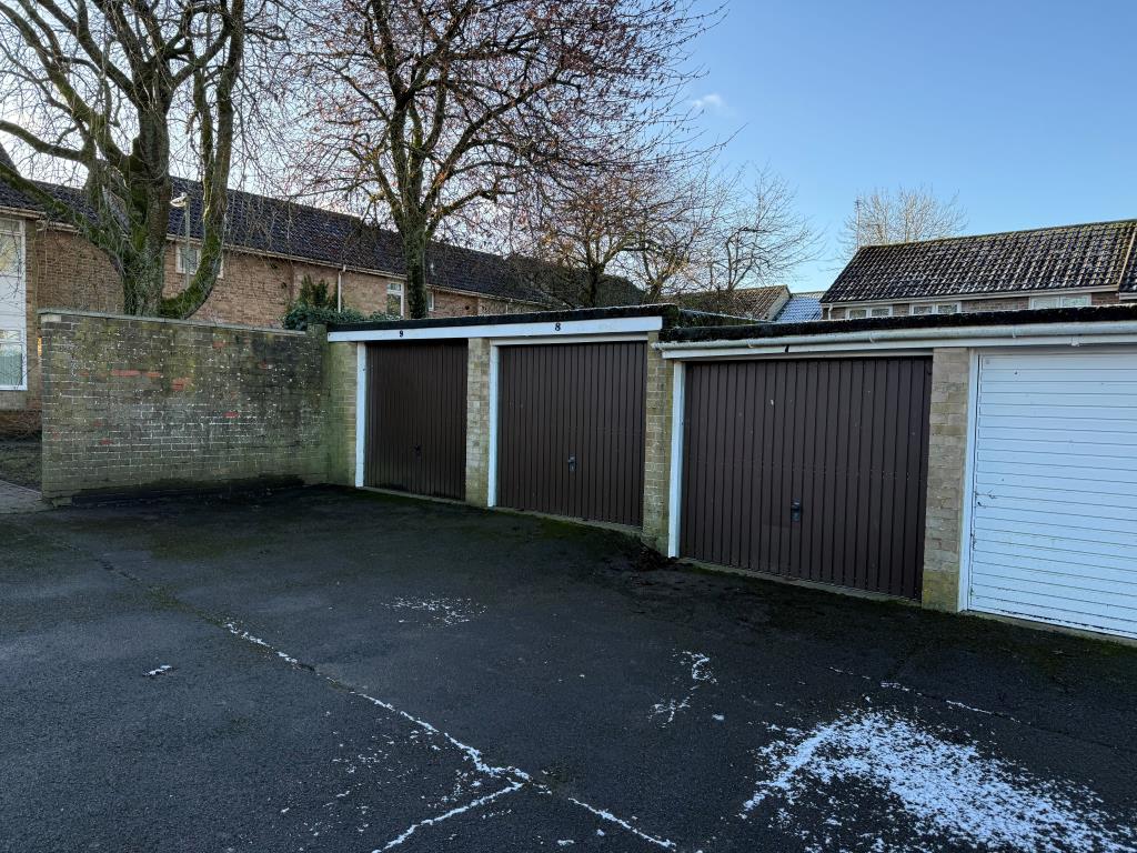 Lot: 22 - LAND WITH THREE GARAGES IN A BLOCK - Garages with up and over doors