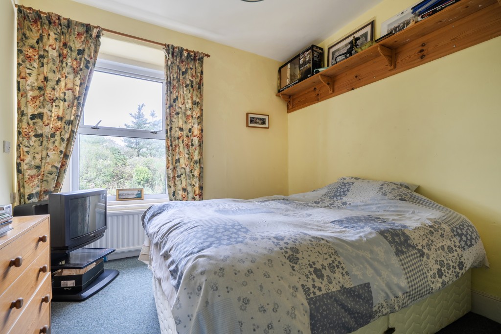 Lot: 47812 - FORMER CAPTAINS HOUSE PLUS THREE-BEDROOM BUNGALOW SET IN OVER 8.5 ACRES OF LAND WITH COUNTRYSIDE AND SEA VIEWS - Bedroom three