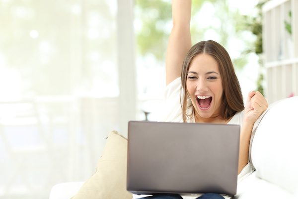 A buyer celebrates online auction success